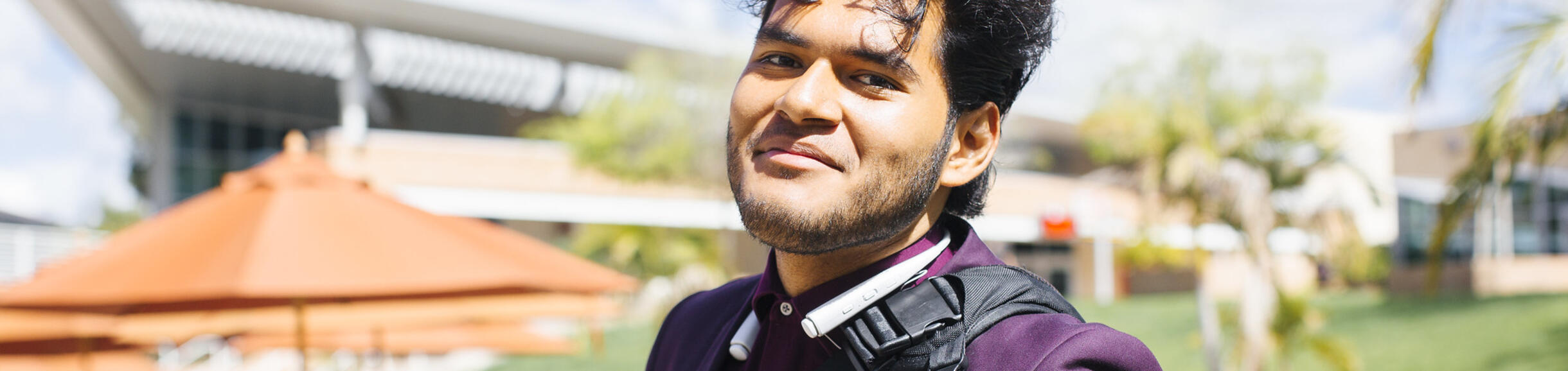 Student in Purple Suit